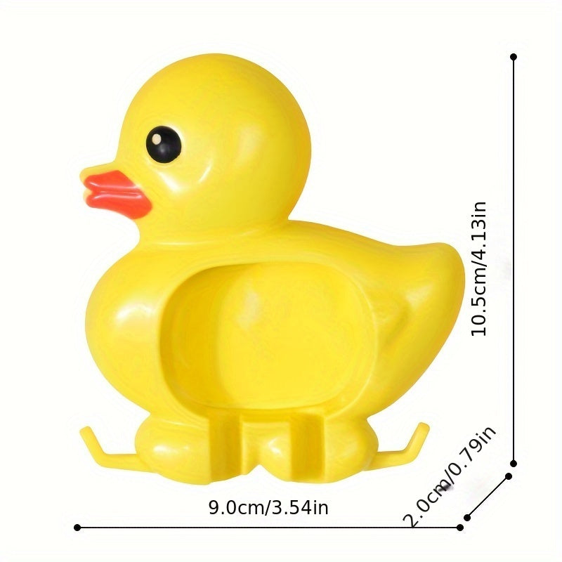 Wall-mounted toothbrush holder with cute duck design, waterproof plastic organizer with suction cup, no-drill installation, home decor.