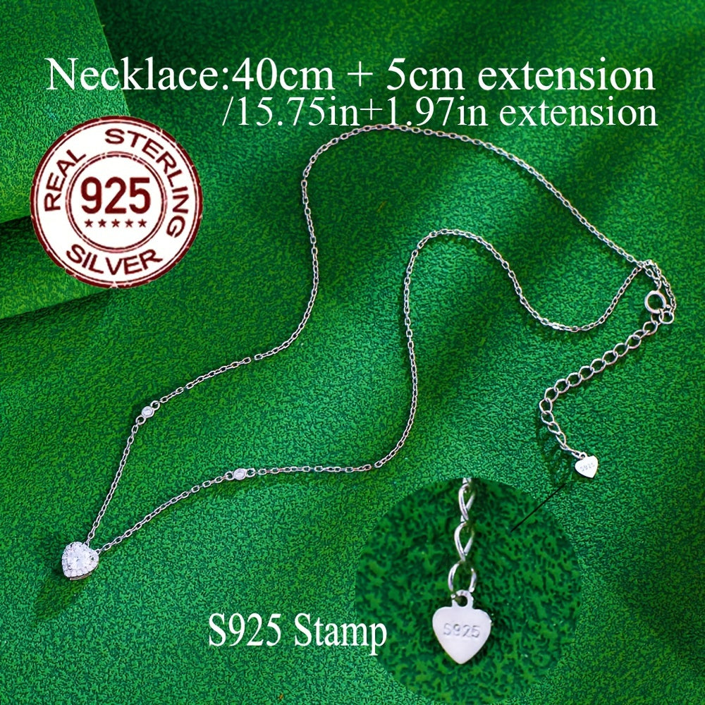 An Elegant Jewelry Set for Women, adorned with a Romantic Heart Design crafted from 925 Sterling Silver, weighing 5.7g/0.201oz. This stunning set features low allergenic properties and is embellished with sparkling White Cubic Zirconia in a Three-Prong