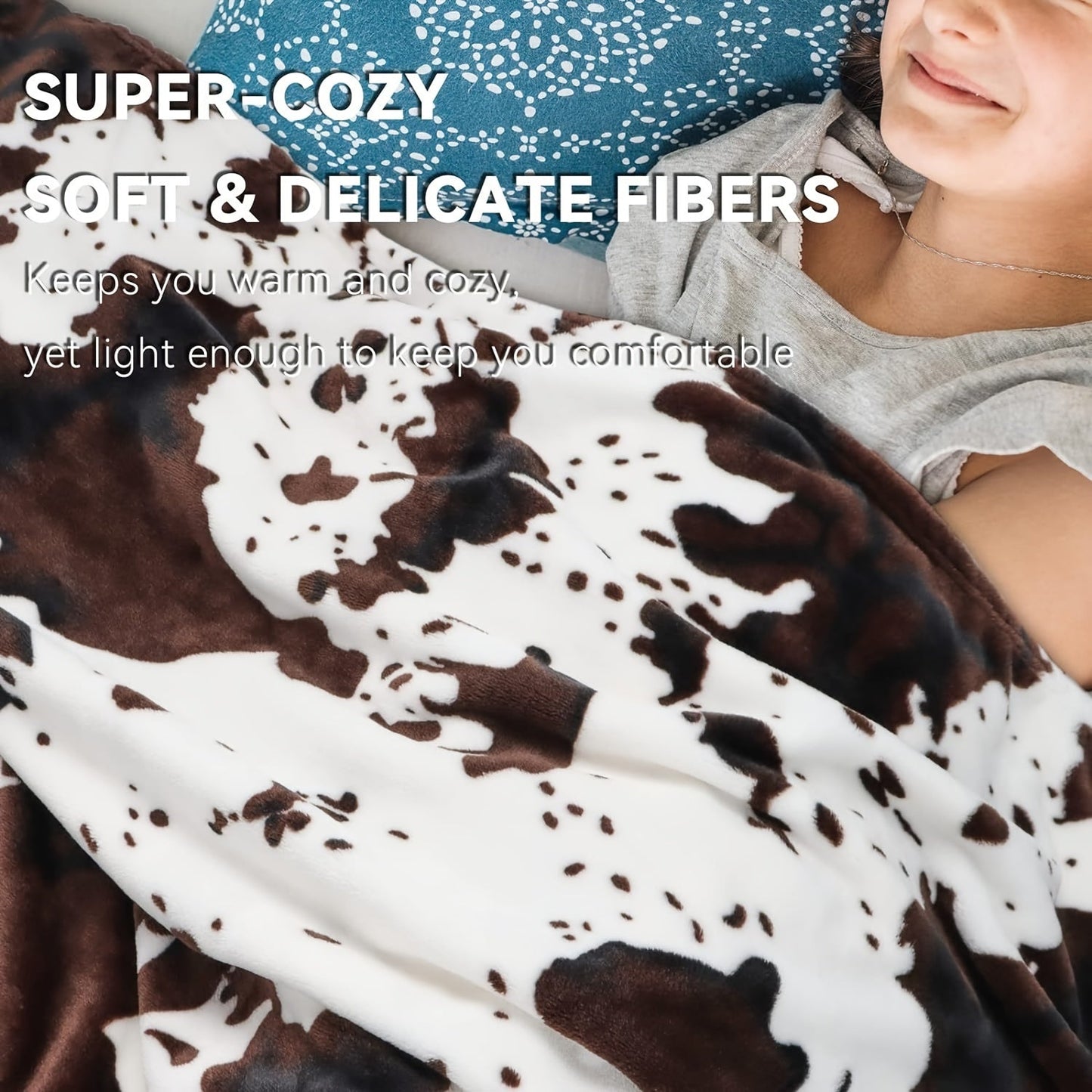 Soft and lightweight, this plush flannel blanket in a cozy cow print is made of 100% polyester for all-season comfort. Perfect for snuggling on the couch or taking on travel adventures, its adorable brown and white design adds a touch of charm to any