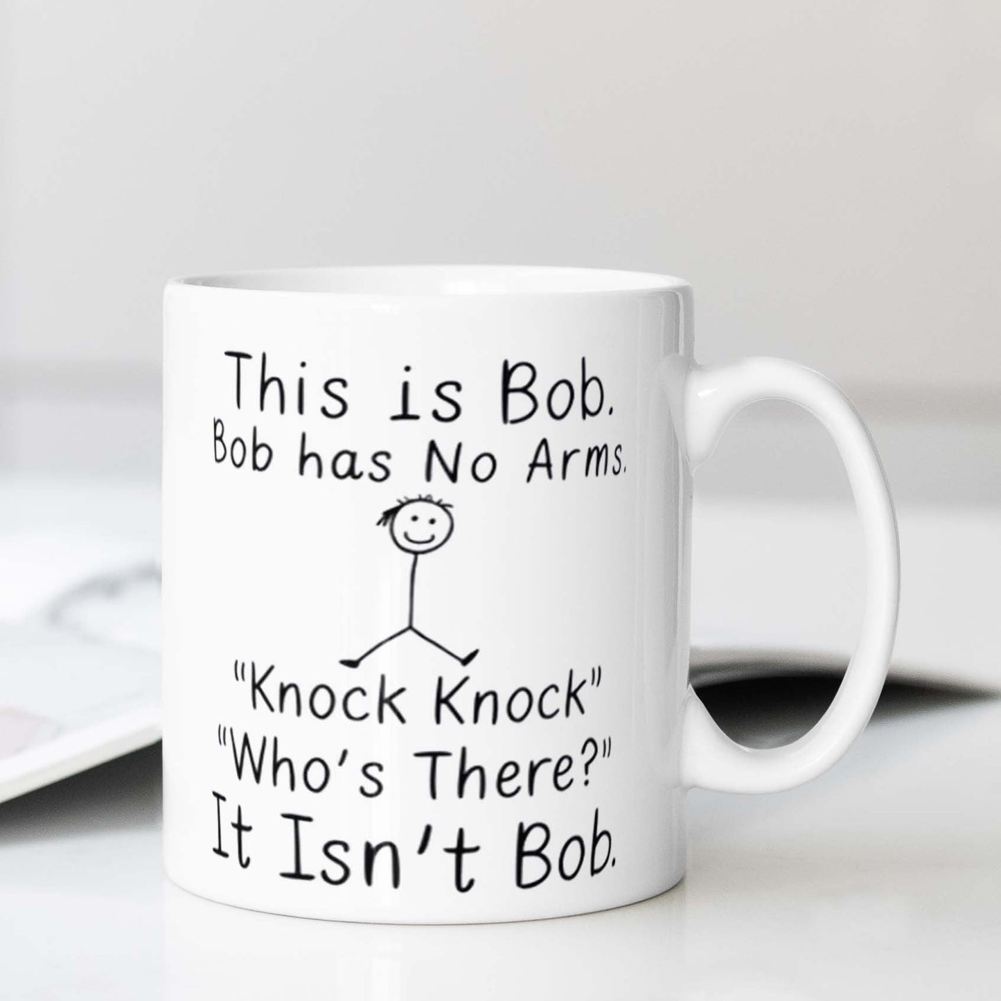 Get a laugh with the 1pc humorous 'Bob Has No Arms' ceramic mug! This versatile coffee cup is perfect for the office, camping, or dining. It's food-safe and requires no electricity. Ideal for gifting!