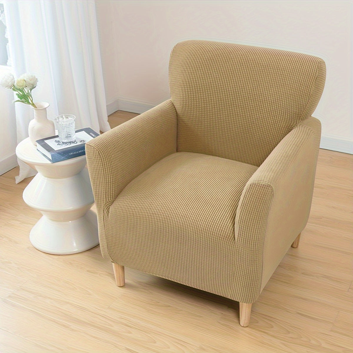 Modern armchair slipcover with slip-resistant design, machine washable polyester/spandex, and elastic-band closure - fits standard armchairs.