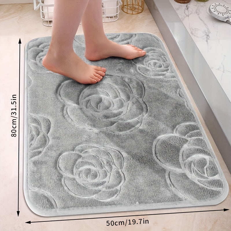 Soft and luxurious bath mat featuring a beautiful rose embossed design. This non-slip bathroom rug is made of ultra-soft knit polyester, providing superior comfort and absorbency. Lightweight and washable, this versatile mat is perfect for use in the