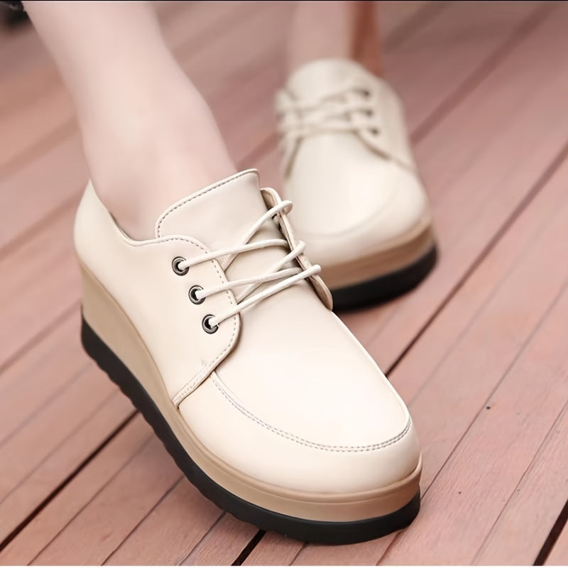 Women's lace-up low top shoes with solid color, comfortable all-season design, featuring a plain toe and PU sole. Made with man-made materials.