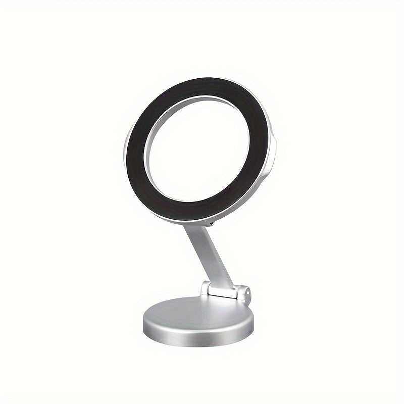 Metal high-strength magnetic mobile phone holder for car, foldable and 360-degree rotatable on dashboard for navigation.