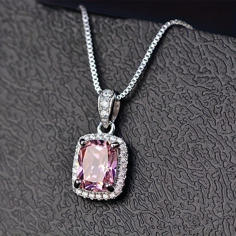 Beautiful silver plated pendant necklace featuring a faux amethyst stone, perfect for women to wear at bridal weddings or parties. This stunning piece of jewelry would also make a thoughtful gift.