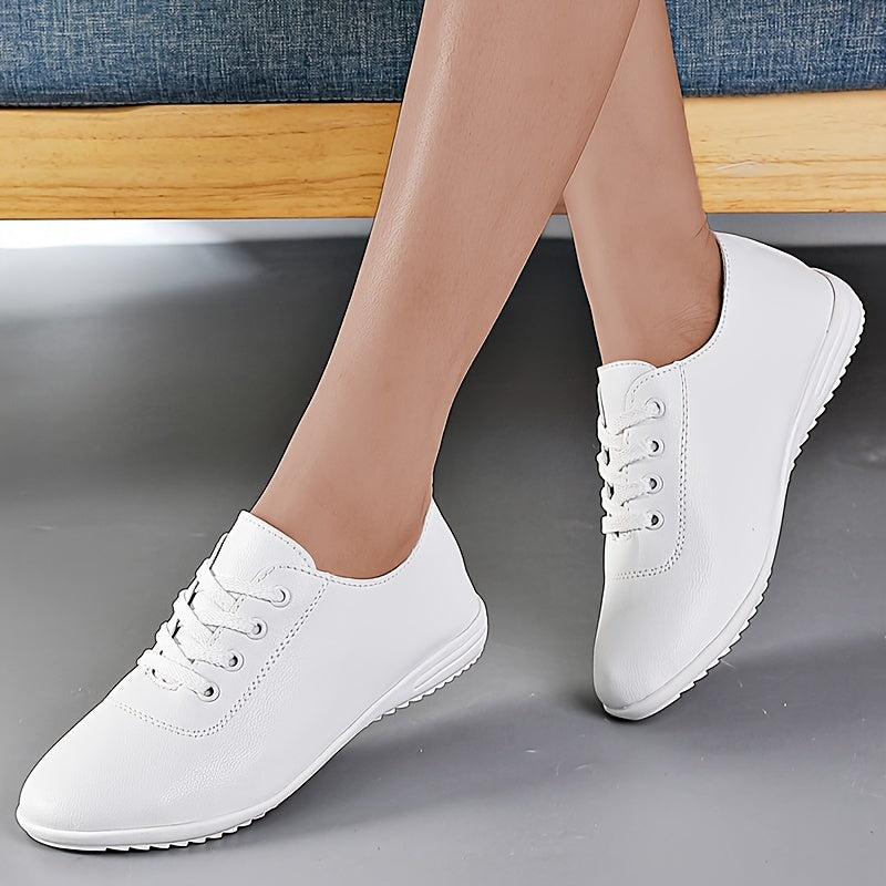 Casual white sneakers for women with lightweight, durable, non-slip design, round toe, lace-up style, faux leather upper, and PU sole, ideal for casual outfits.