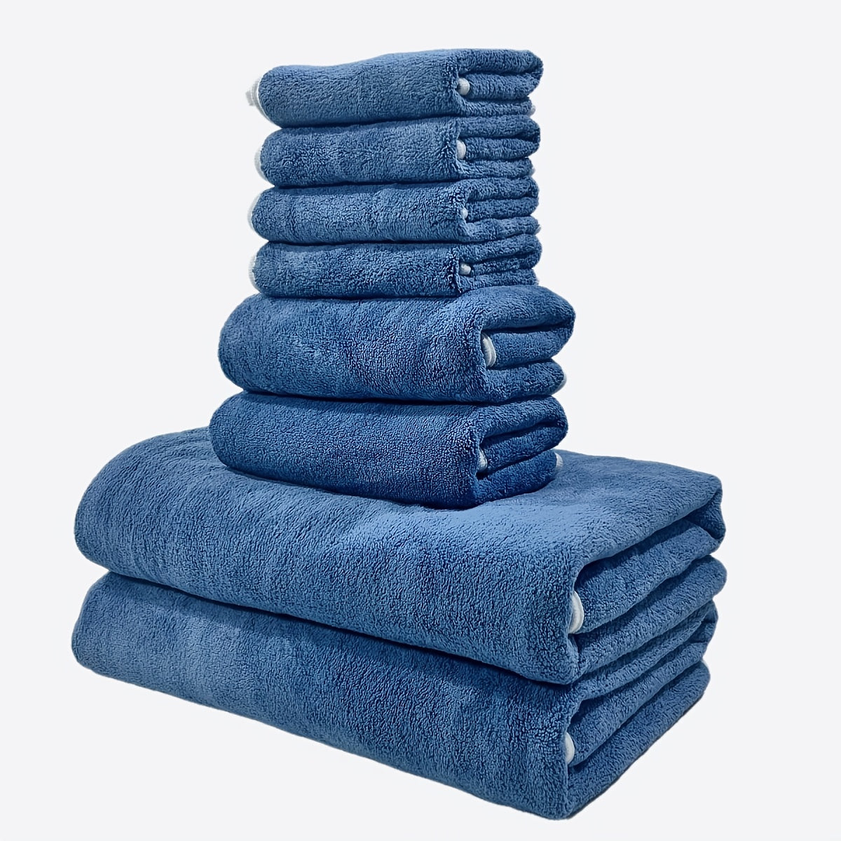 This 8-piece set includes 2 bath towels (68.58 X 139.7 cm), 2 towels (34.8 X 74.93 cm), and 4 square towels (29.97 X 29.97 cm). They are super soft, quick-drying, absorbent, and