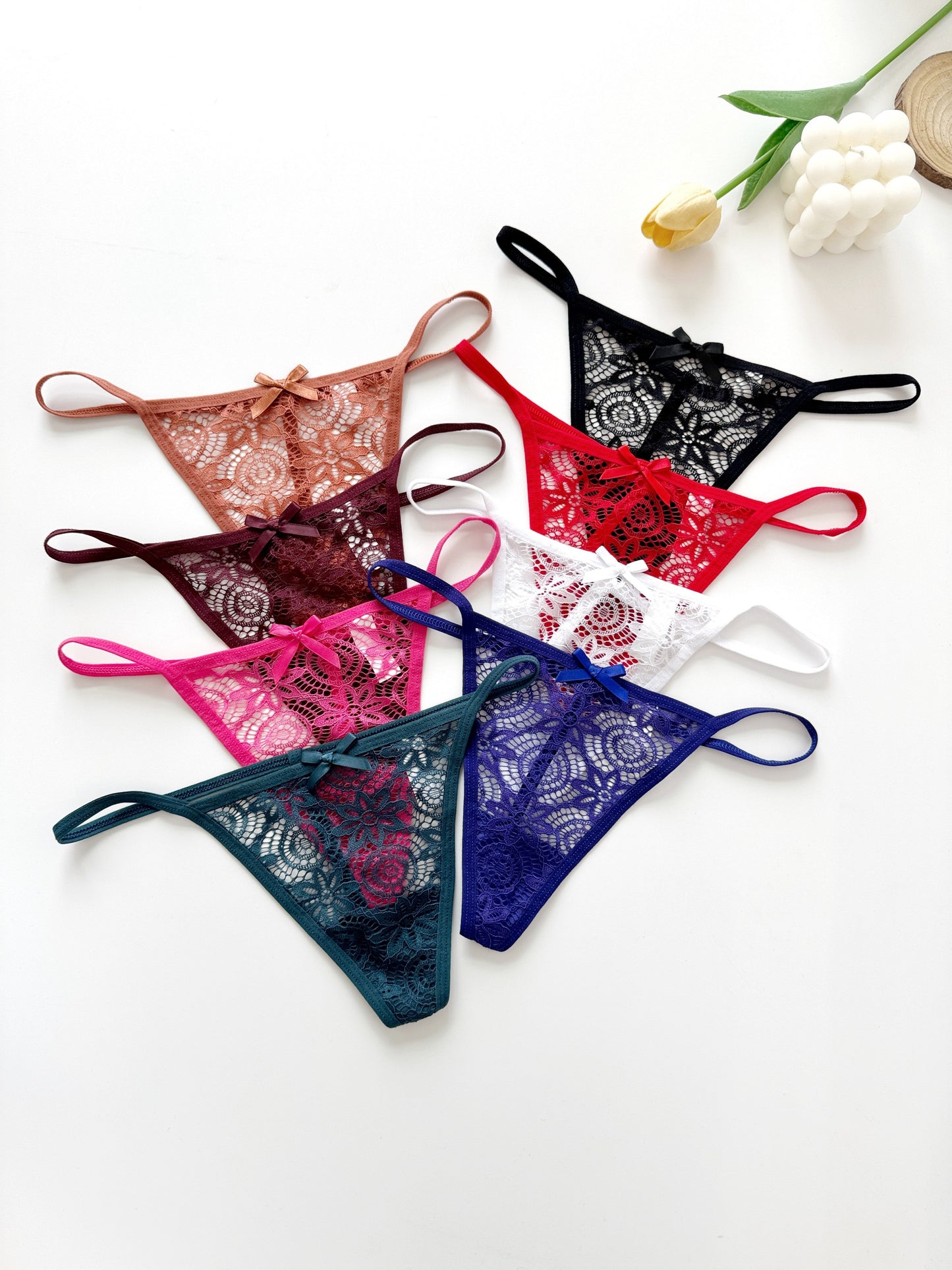 New thin strap low waist thong with lace, bowknot, and see-through design for a comfortable and breathable fit.