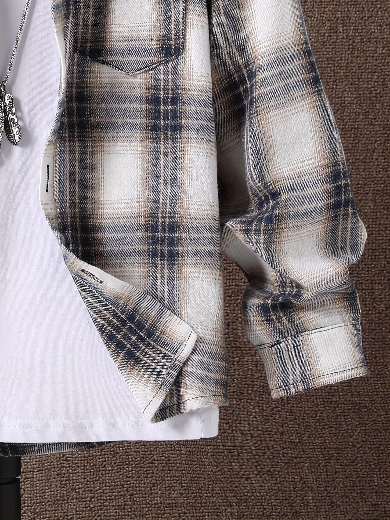 Plaid hooded shirt for boys in cozy knit fabric with pockets, regular fit and slight stretch, perfect for fall/winter season.