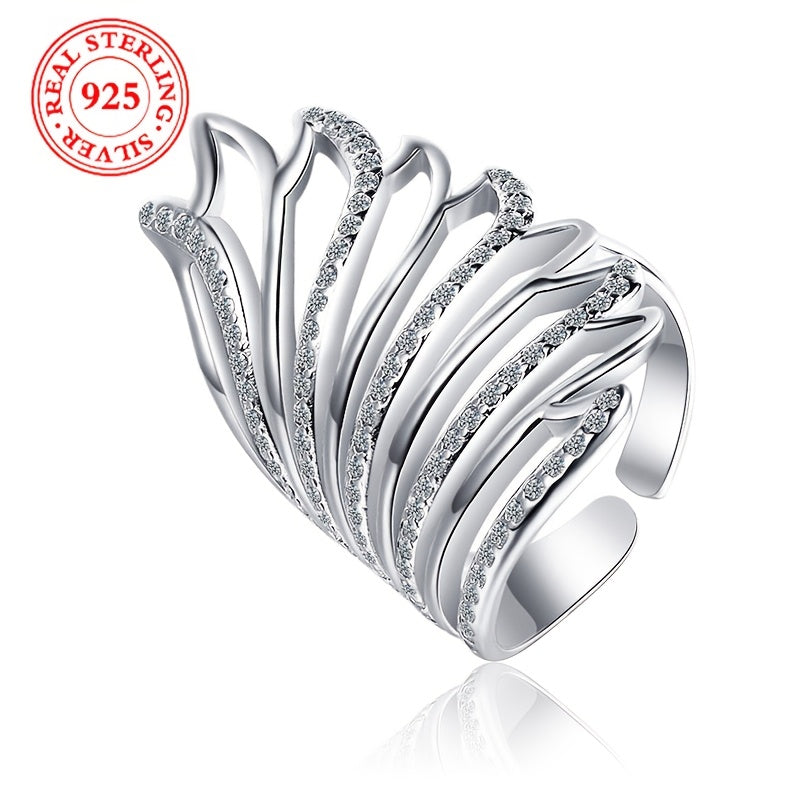 This elegant ring for women exudes a touch of luxury, featuring intricate angel wings with sparkling synthetic zirconia. Made of lightweight silver weighing 6 grams, this open ring is perfect for daily wear, special occasions, and weddings.