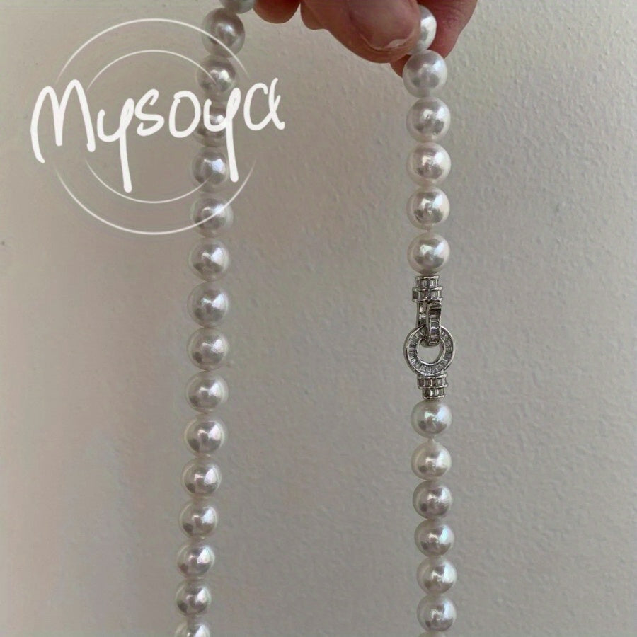 Elevate your style with the MYSOYA Elegant Large Natural White Pearl Necklace, featuring stunning 9-10mm pearls. This necklace comes in an exquisite gift box, making it perfect for any occasion - from daily wear to parties, birthdays, anniversaries