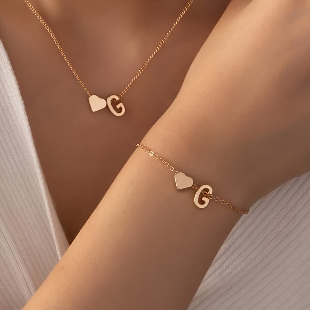 Chic two-piece set with metal heart and letter necklace and bracelet, ideal for daily wear.