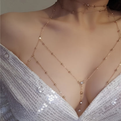 Golden-tone beaded body chain necklace with rhinestone detailing, perfect for parties and dates, versatile for all seasons.