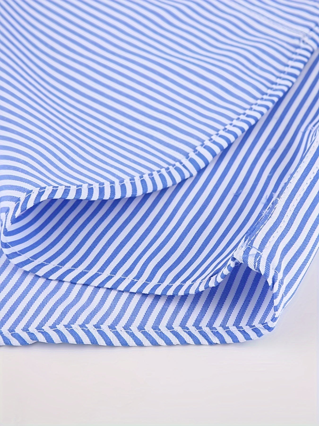 Men's French-style dress shirt with stripes and cufflinks included.