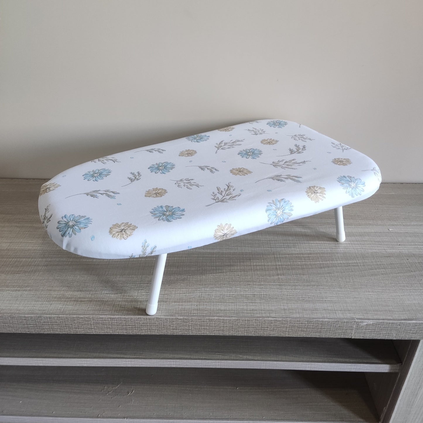 Compact Floral Design Ironing Board, Foldable Tabletop Clothes Pressing Pad, Sturdy Plastic Material, Secure Base, Convenient Space-Saving Option