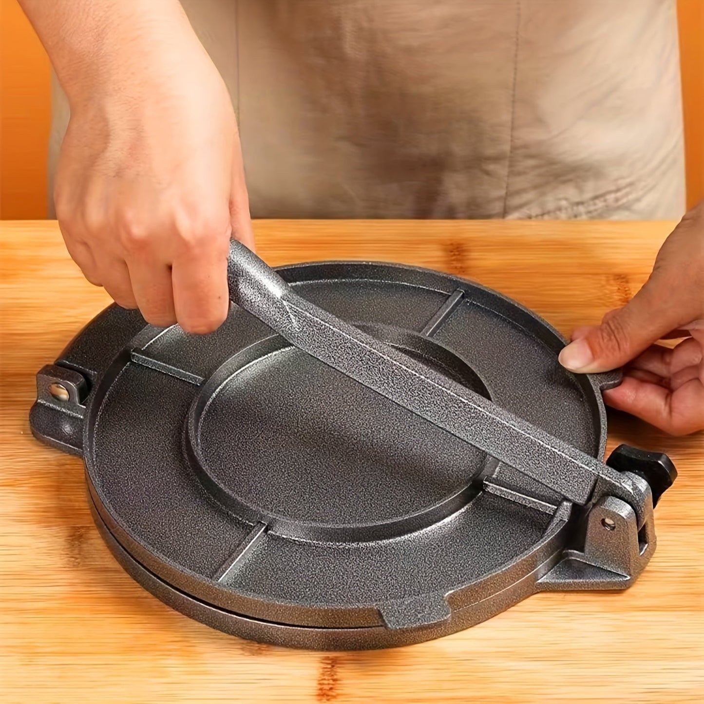 This manual flapjack maker is constructed of durable aluminum alloy and is perfect for making homemade pancakes. It features a strong structure for easy pressing and is simple to clean. No electricity is required for this convenient crepe machine.