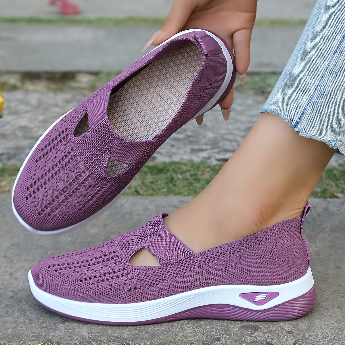 Women's lightweight slip-on running sneakers with breathable fabric and rubber sole for year-round comfort.