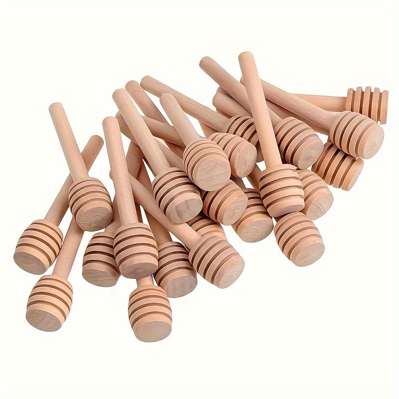 Mini Wooden Honey Spoons available in quantities of 10, 30, or 50. These long-handled wooden spoons are perfect for stirring honey in bars or jars, as well as mixing milk tea or desserts in the kitchen. A versatile tool for any honey lover's collection.