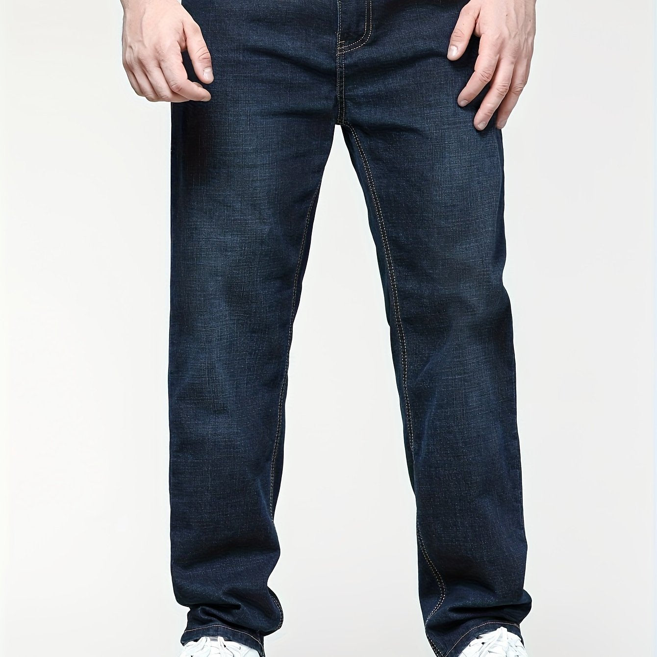 Men's solid denim pants for spring and fall in plus sizes.