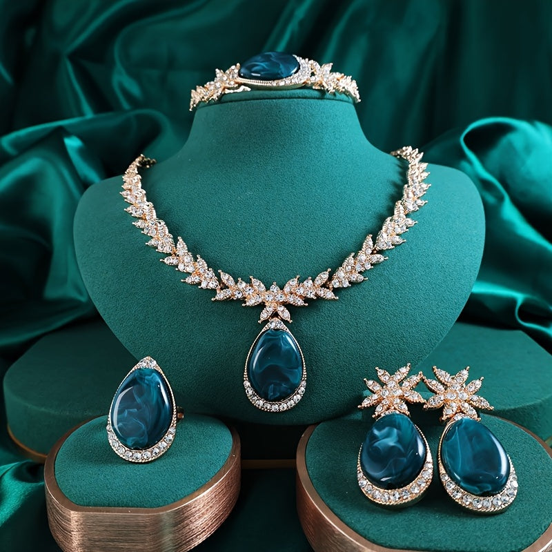 Experience luxury with our 18K Gold Plated Alloy Jewelry Set adorned with sparkling rhinestones. This 4-piece set oozes elegance and is perfect for your vacation outfits. Ideal for weddings, gifts, and Valentine's Day, our Gold Plated Bridal Party Sets