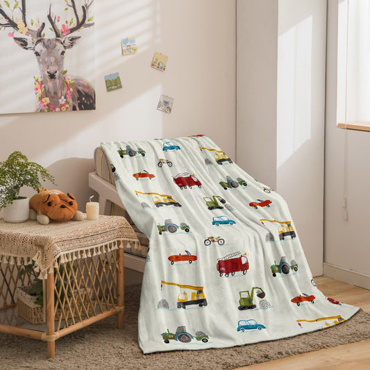 Soft and cozy cartoon construction vehicle flannel throw blanket, perfect for all seasons - gentle on your skin and provides warmth.