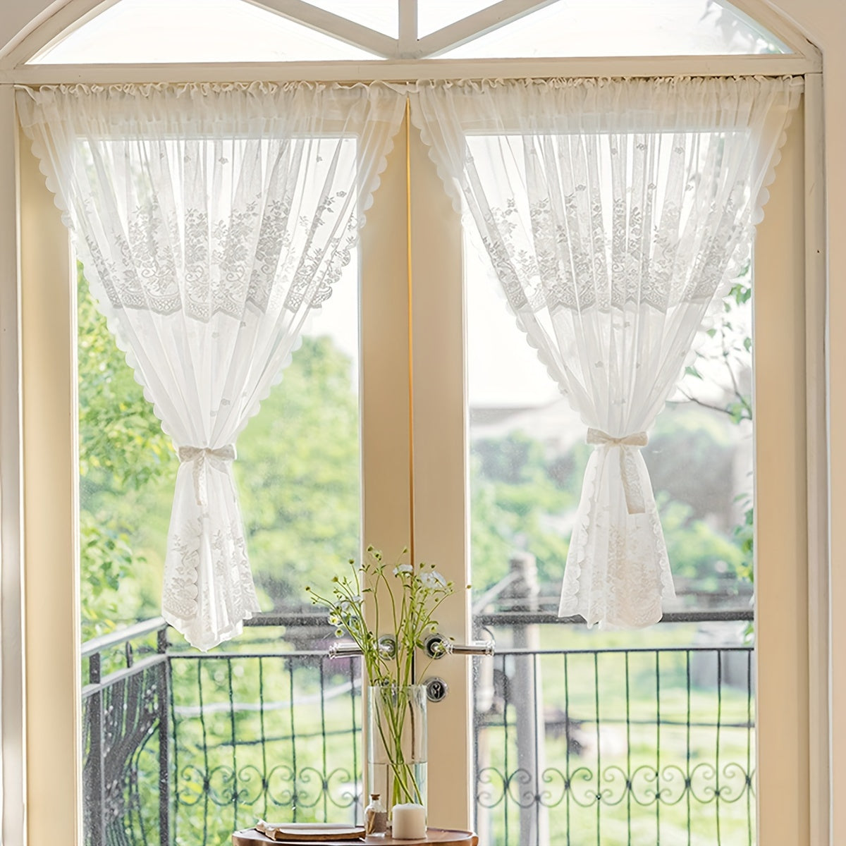 Add a touch of charm to your living space with this lovely White Floral Lace Curtain featuring a Sweet Garden Style. The Rod Pocket Design makes hanging a breeze, making it perfect for windows and doors in the living room, bedroom, or kitchen. Made of