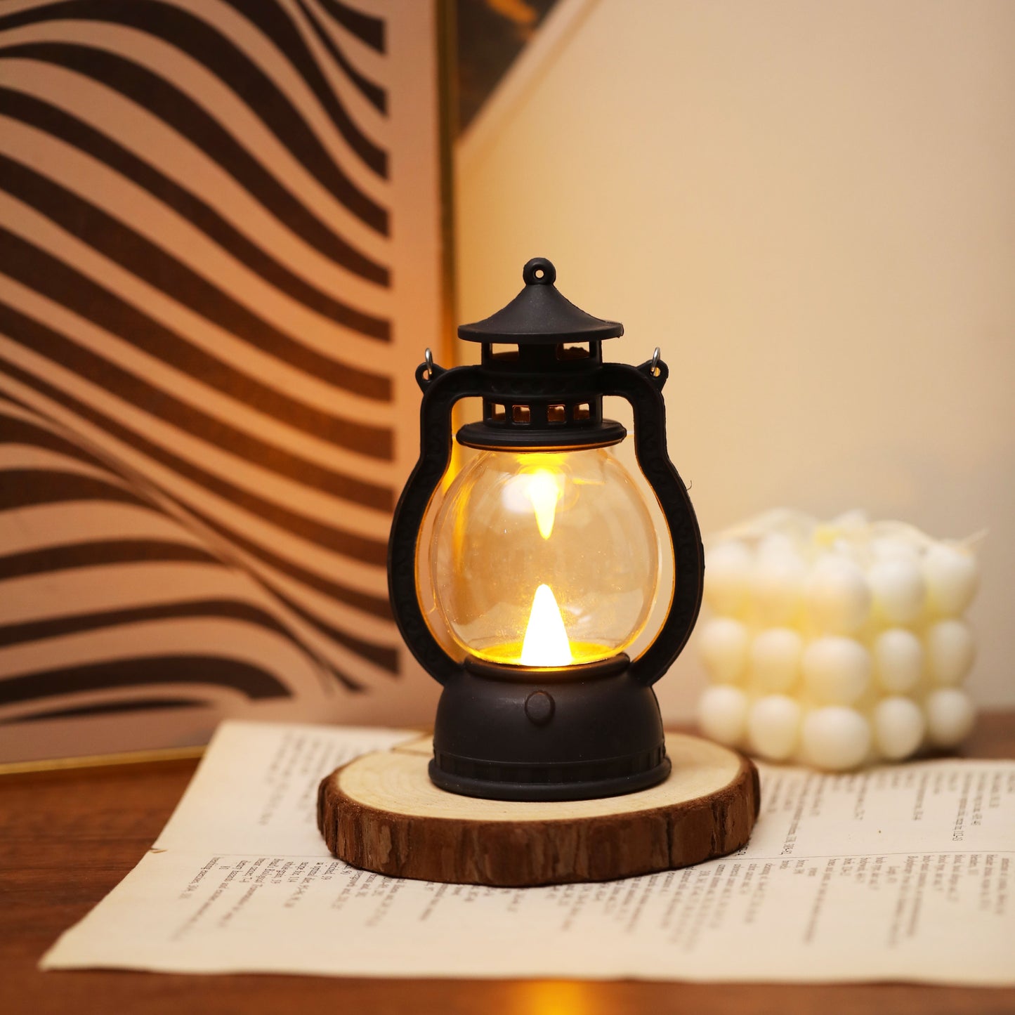 Mini LED lantern with battery included, ideal for decoration in bedroom, desk, wedding, party, or holidays. Made of plastic with faux candle light, non-rechargeable button battery included.