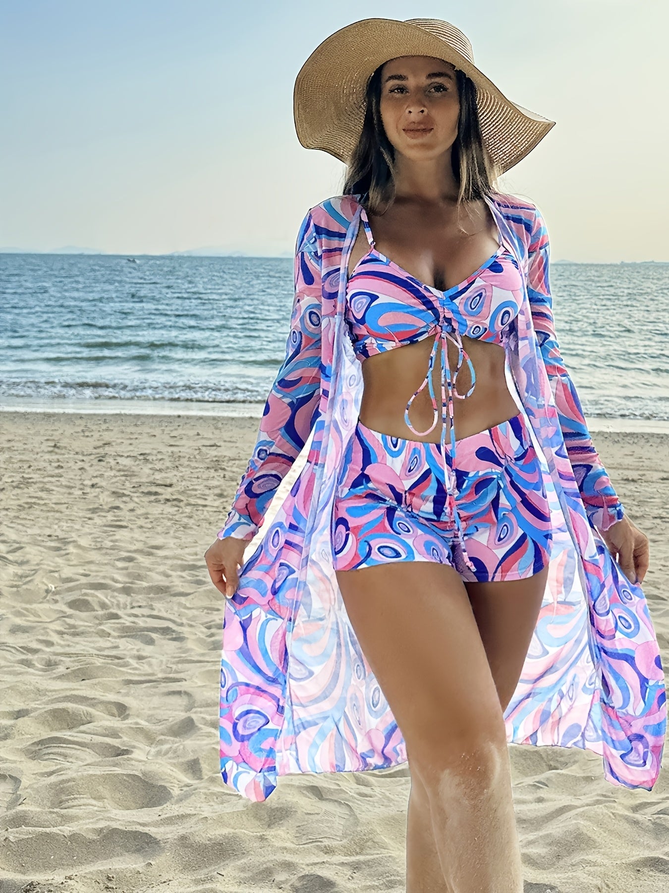 Stylish geometric bikini set for women with long sleeve cover-up - made from stretchy, non-see-through polyester blend that can be machine washed.