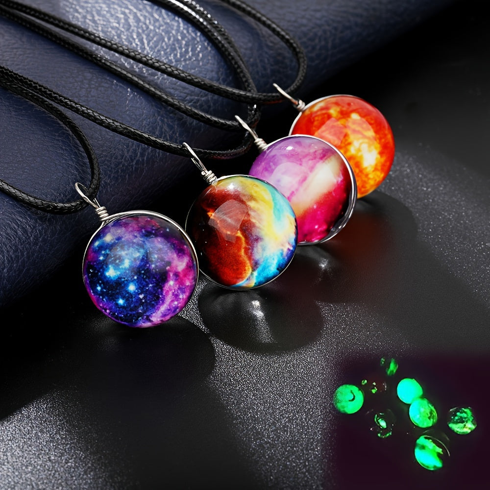 Set of 4 Starry River pendant necklaces featuring dual-sided glass orb and a luminous boho-retro style. Each necklace showcases a cosmic dreamy space gemstone that glows in the dark, making it the perfect accessory for music festivals, travel, and beach