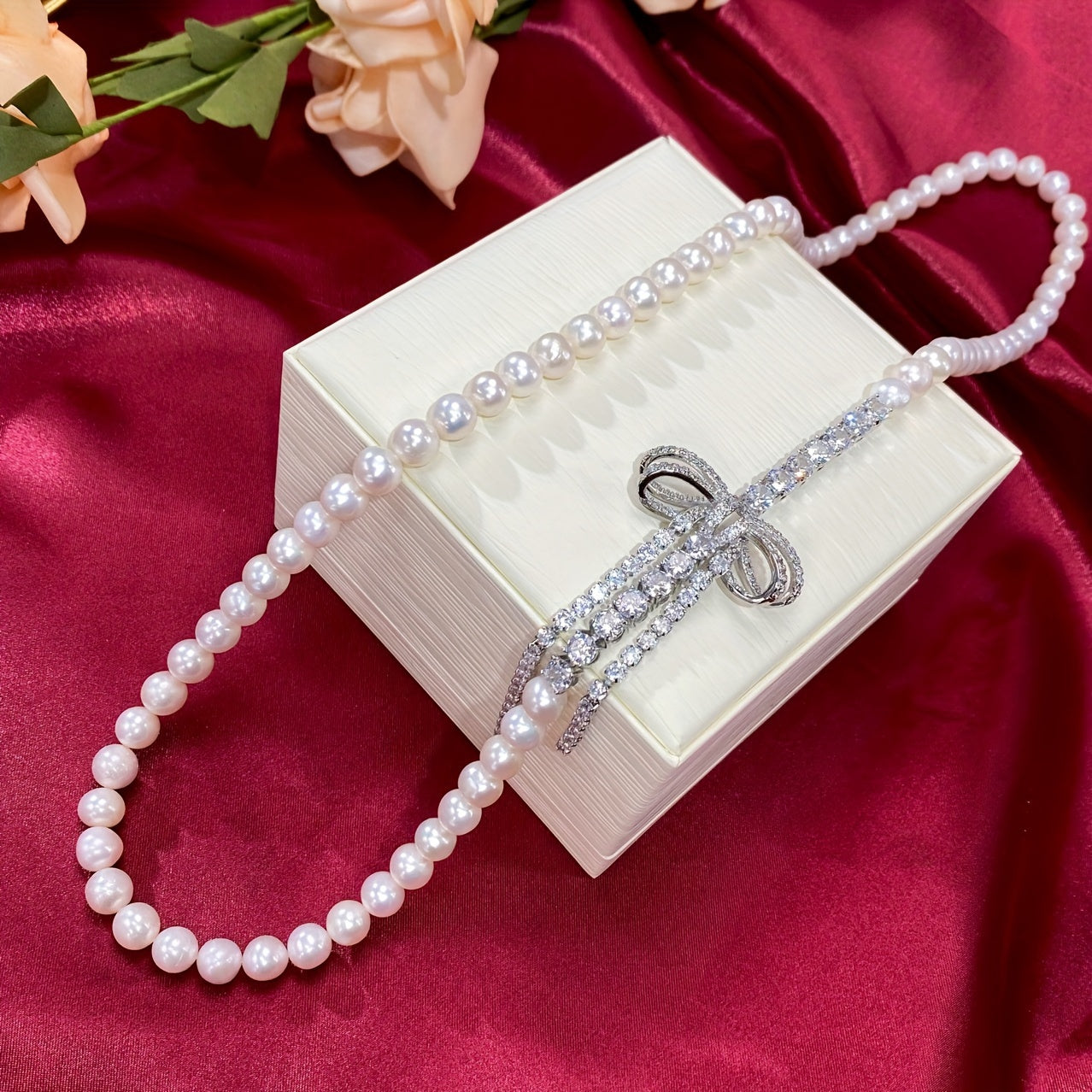 Chic Pearl Necklace adorned with Sparkling Cubic Zirconia Bow - Ideal for Weddings, Mother's Day, and Special Events