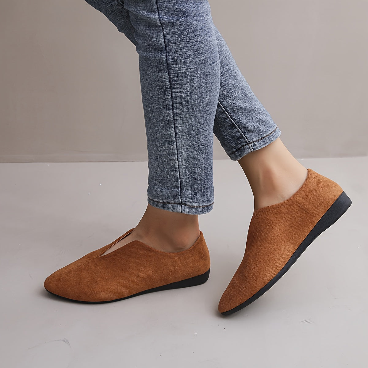 Women's solid color casual flats with a soft sole and point toe.