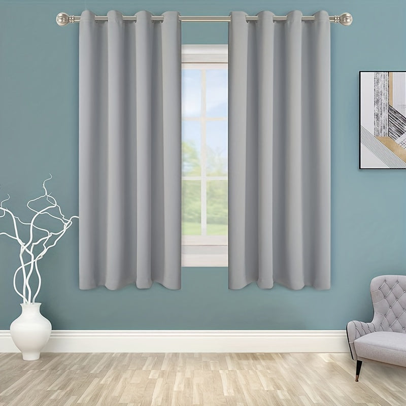 Enhance your space with this 1-panel blackout curtain in solid black color, designed to insulate against heat and cold, darken the room, and reduce incoming light. Perfect for adding style and functionality to your study, bedroom, kitchen, or living room