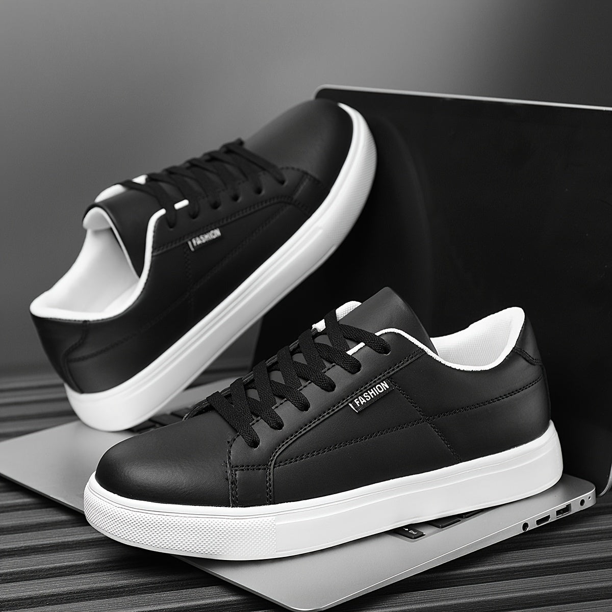 Men's skateboard shoes with solid color and graphic design, lace-up low top style and comfortable EVA sole for daily wear and running.