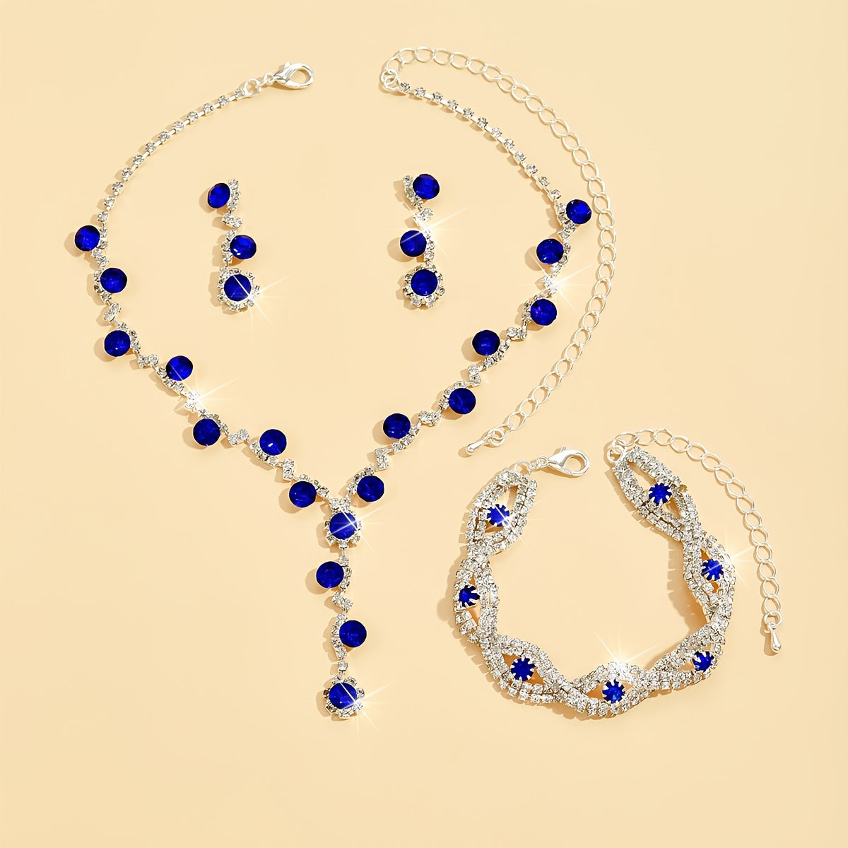 Stunning Jewelry Set in Sapphire Blue - Featuring Silvery-Plated Necklace, Earrings & Bracelet adorned with Synthetic November Birthstone - Ideal for Special Occasions and Celebrations