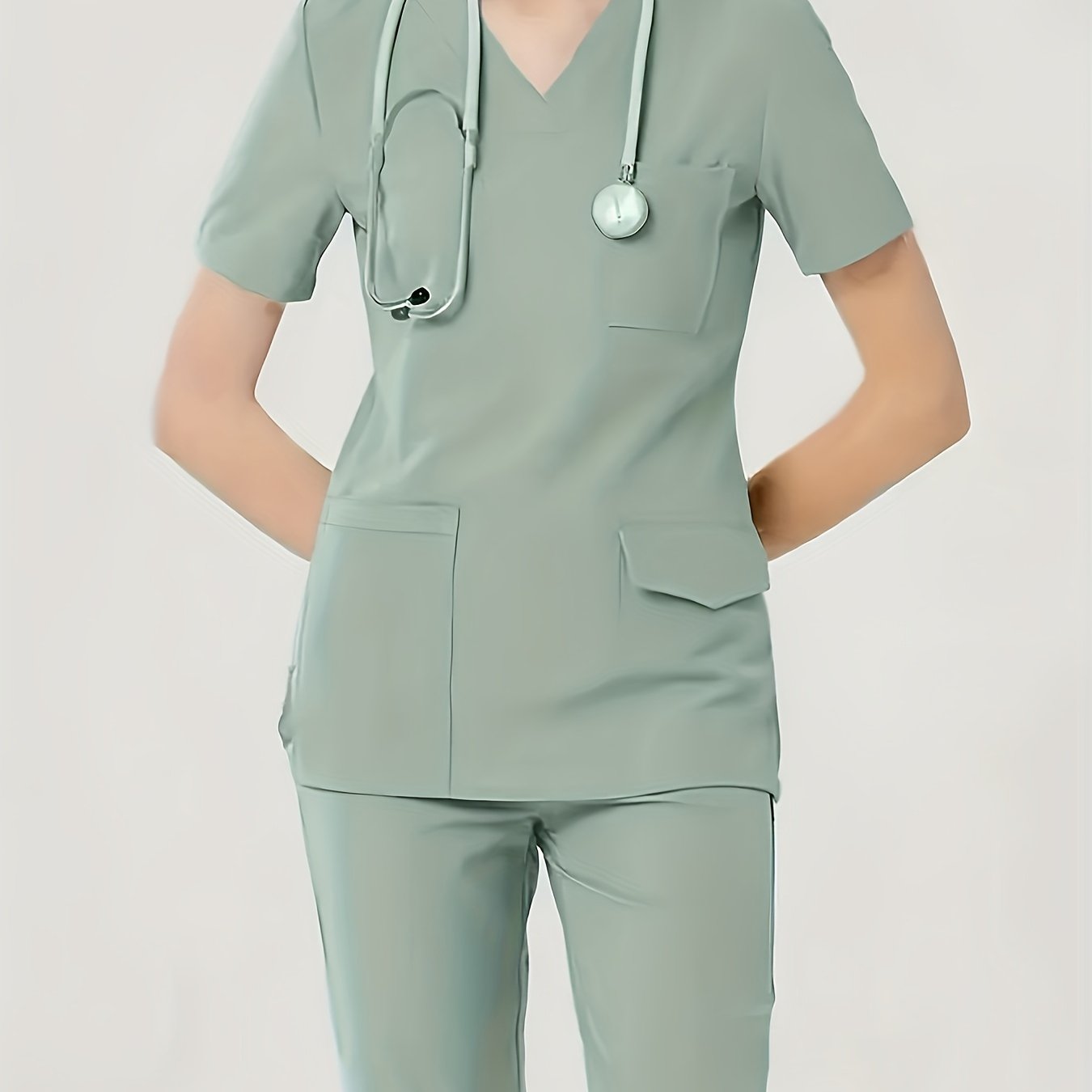 Women's two-piece healthcare uniform with a V-neck top, stretchy fabric, dental scrub gloves, functional pockets, and comfortable fit.