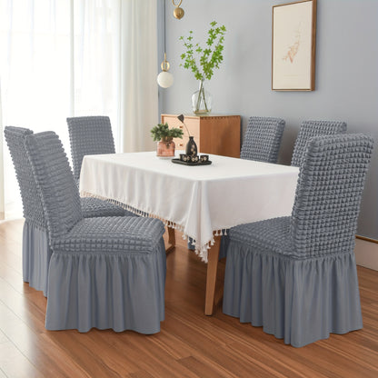 1 Seersucker dining chair slipcover with skirt, non-slip design. Protects furniture in various settings.