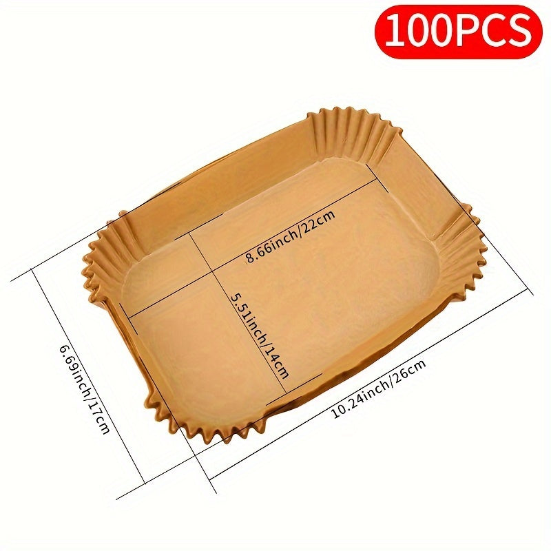 Disposable air fryer liners available in packs of 50, 100, or 200. These rectangular paper liners are designed to fit air fryer pots and basket bowls measuring 26.01cm by 16.99cm. Perfect for baking trays, ovens, and various kitchen accessories and