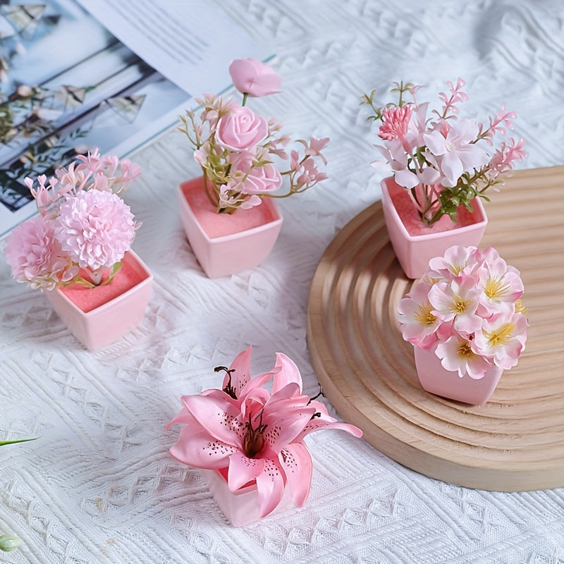 3 mini pink potted plants with faux rose and peach embroidered ball flowers for wedding, home, or office decoration.