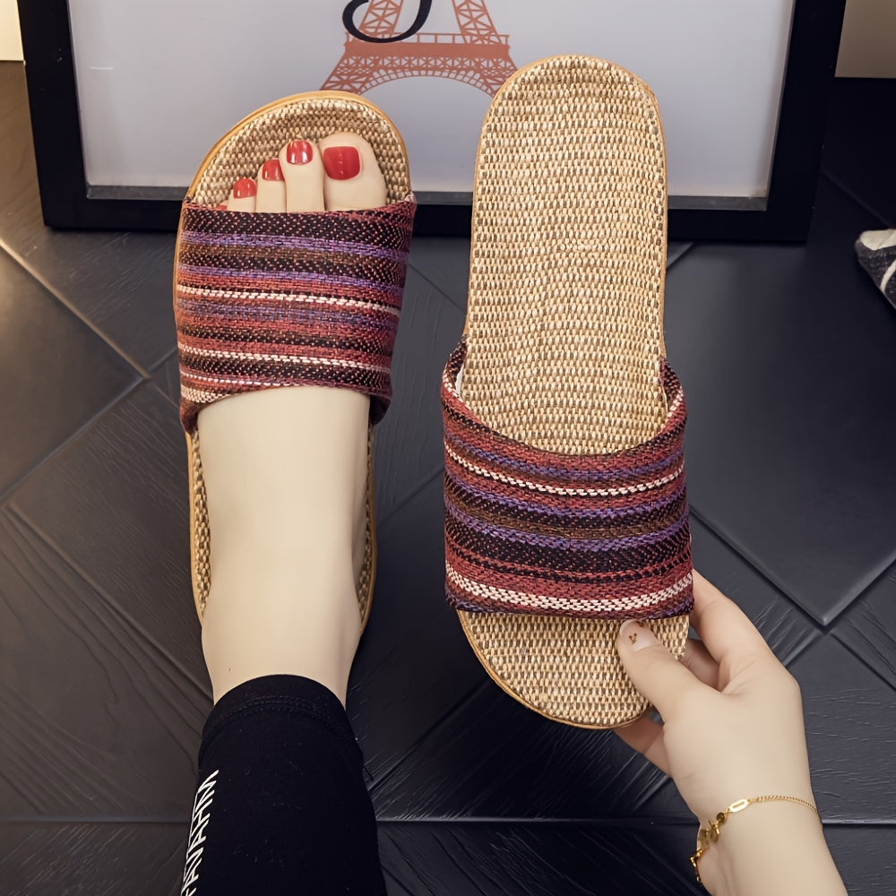 Comfortable home slippers with a striped pattern and casual open toe design.