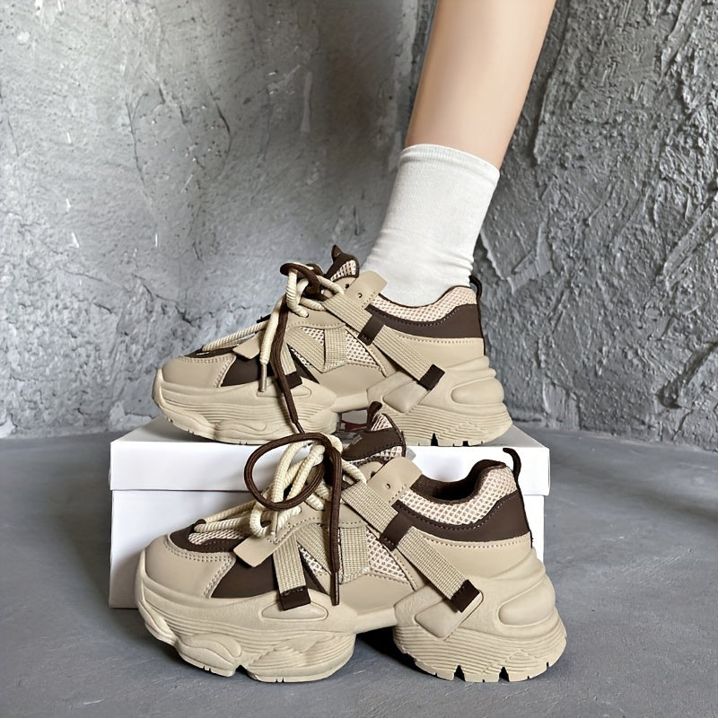 Colorblock lace-up sneakers with soft platform sole for walking comfort.