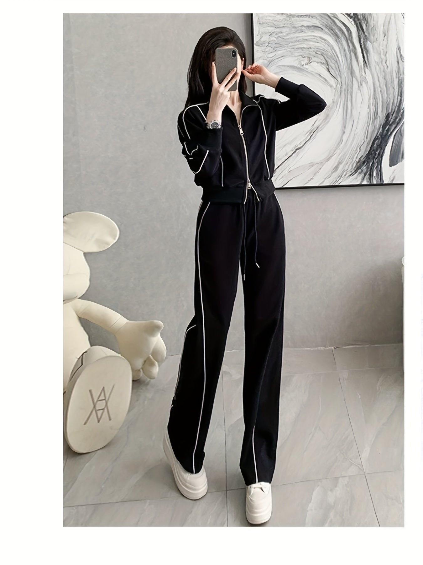 Women's zip-up cardigan and high-waist wide-leg pants set in black, perfect for casual wear. Made from a polyester blend with long sleeves, solid color, and a high-grade European and