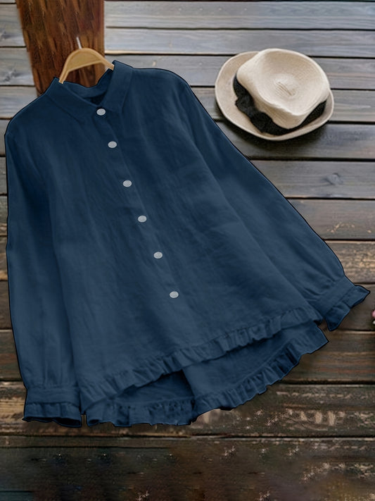 Loose-fitting collared shirt in solid color with front buttons and lace trim.