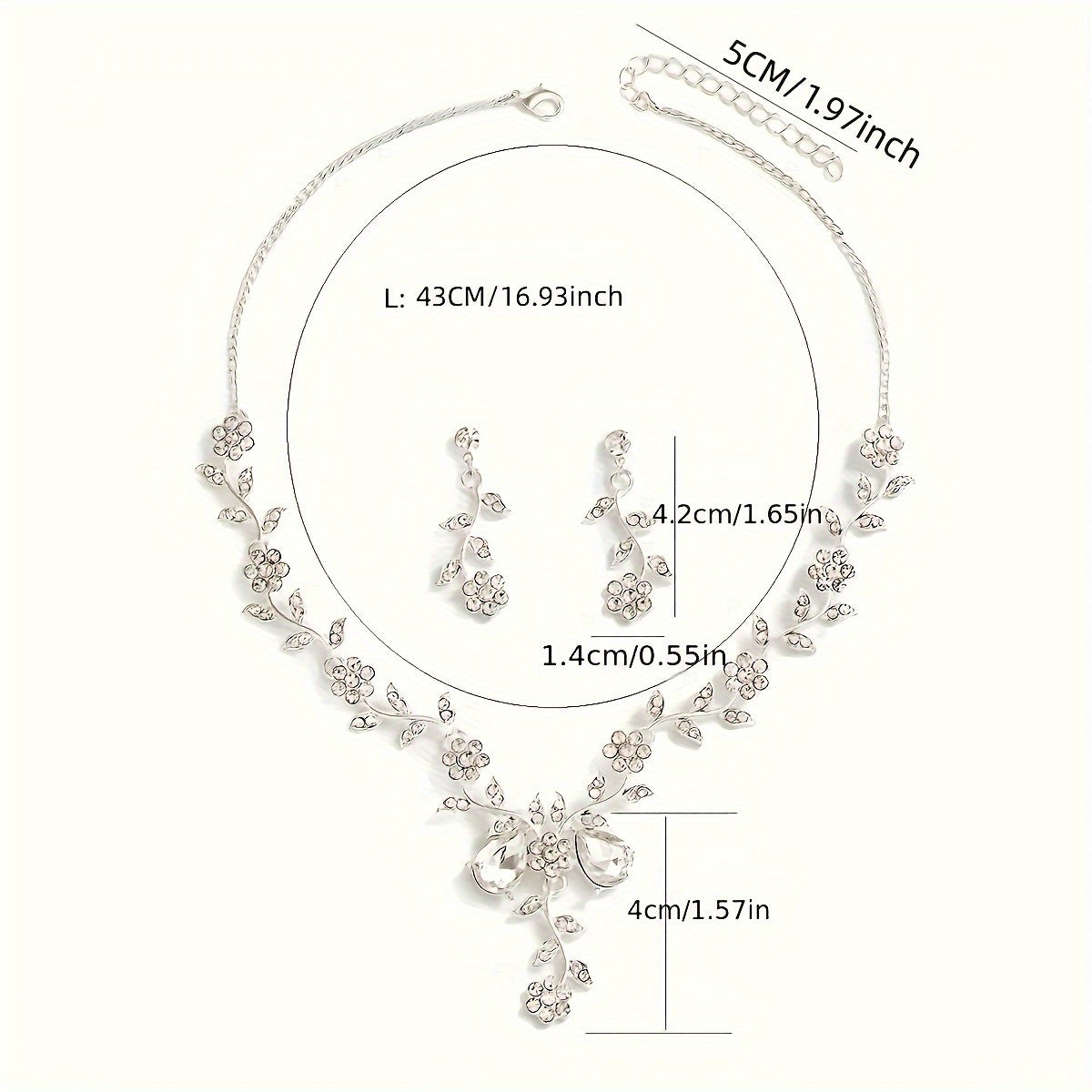 Elegant jewelry set featuring 3 pieces of earrings and a necklace. Adorned with shimmering cubic zirconia, the dainty flower design comes in a choice of silvery or golden tones. Perfect for adding a touch of glamour to your evening party ensemble.