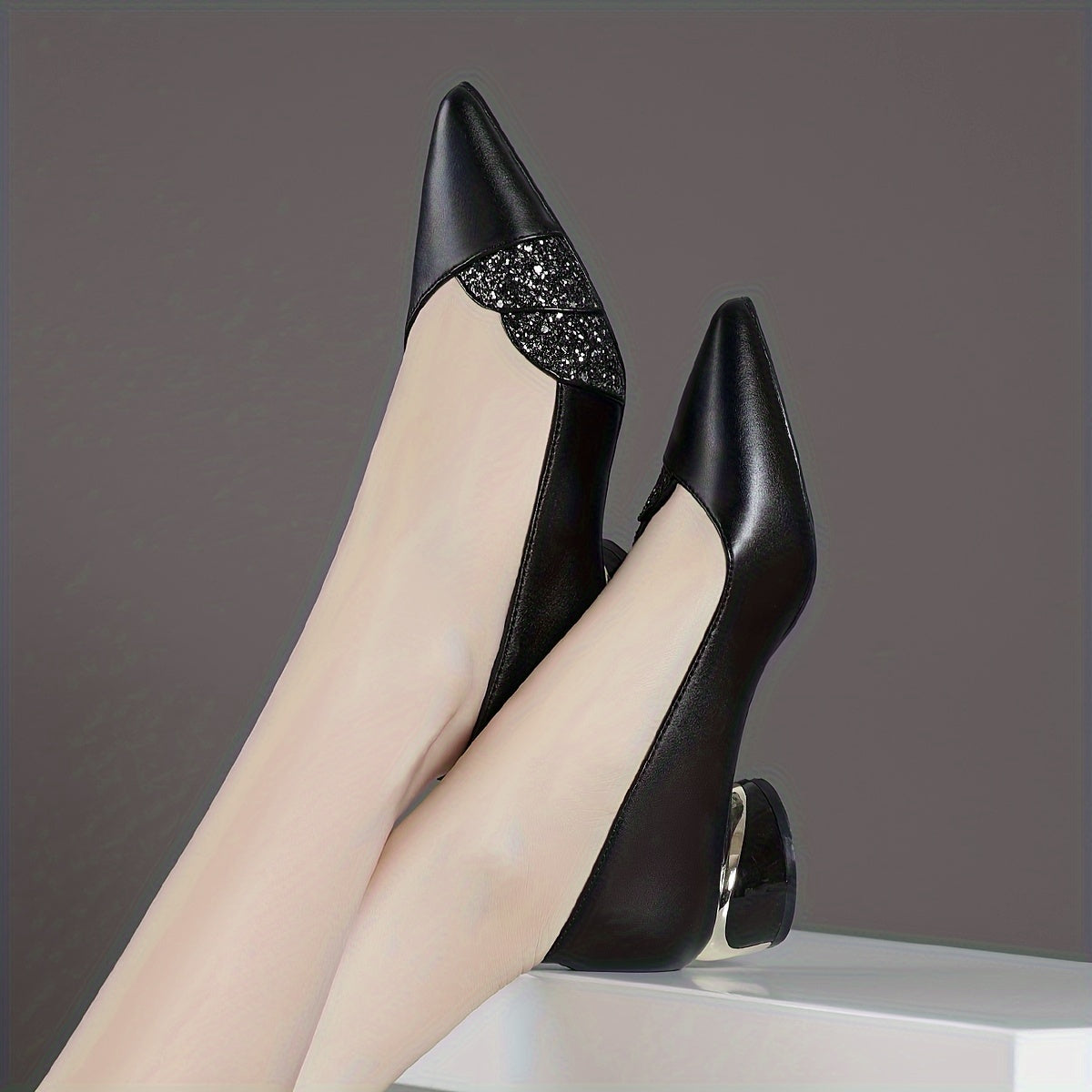 Women's chic pointed-toe pumps with rhinestone detail and comfortable chunky heel, perfect for fall.