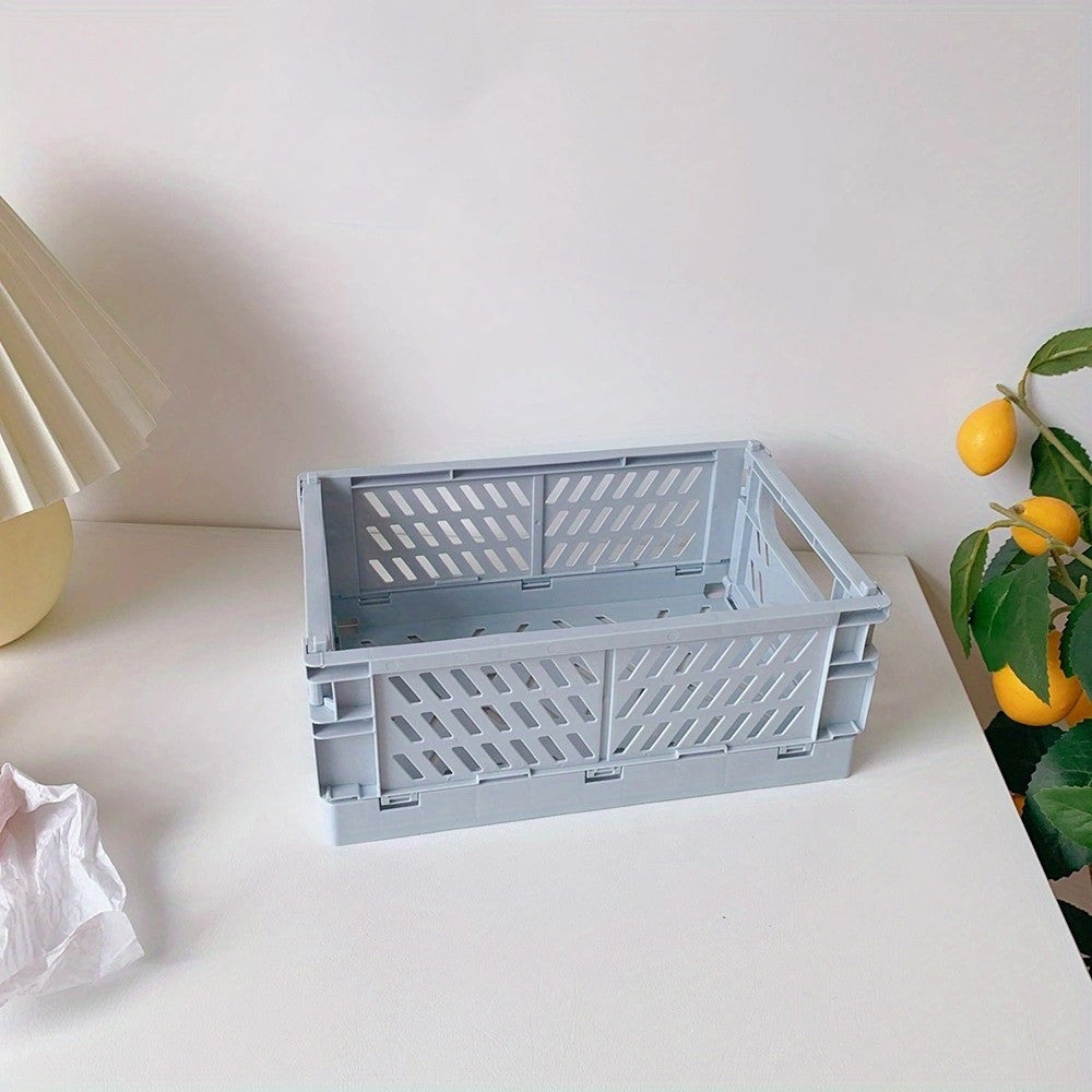 Mini Folding Plastic Storage Box for desktop or home office organization.