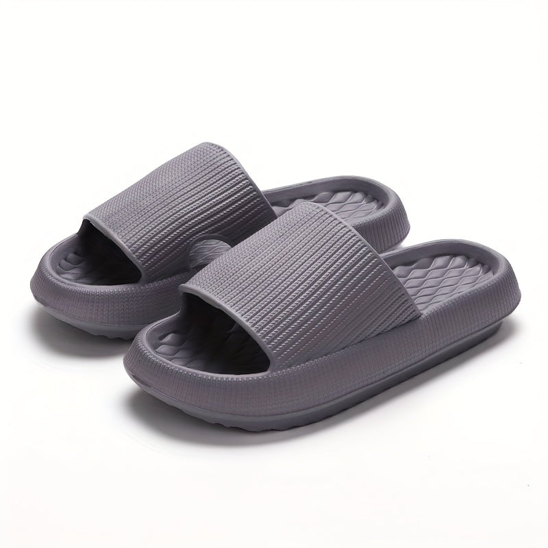 Stylish summer slides for women with thick soles, round toe, and non-slip flat heel, perfect for indoor and outdoor wear, made of comfortable EVA material.