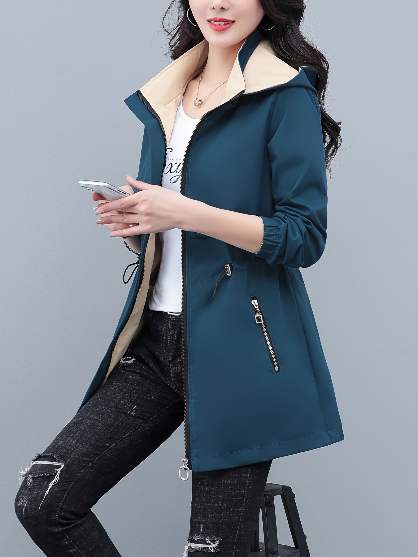 Spring and fall jacket for women: Long sleeve windbreaker with drawstring waist and zip-up hoodie.