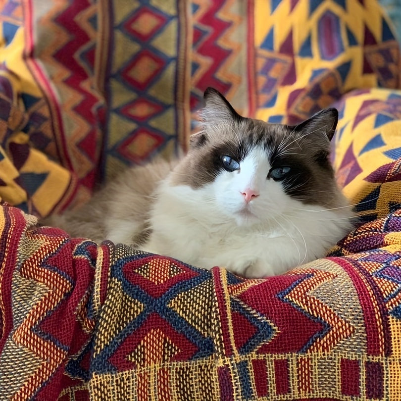 Add a touch of Aztec charm to your home with this Bohemian-inspired reversible throw blanket. Featuring a geometric pattern, chunky knit weave, tassel embellishment, and made from all-season multipurpose synthetic fiber, it is the perfect couch protector