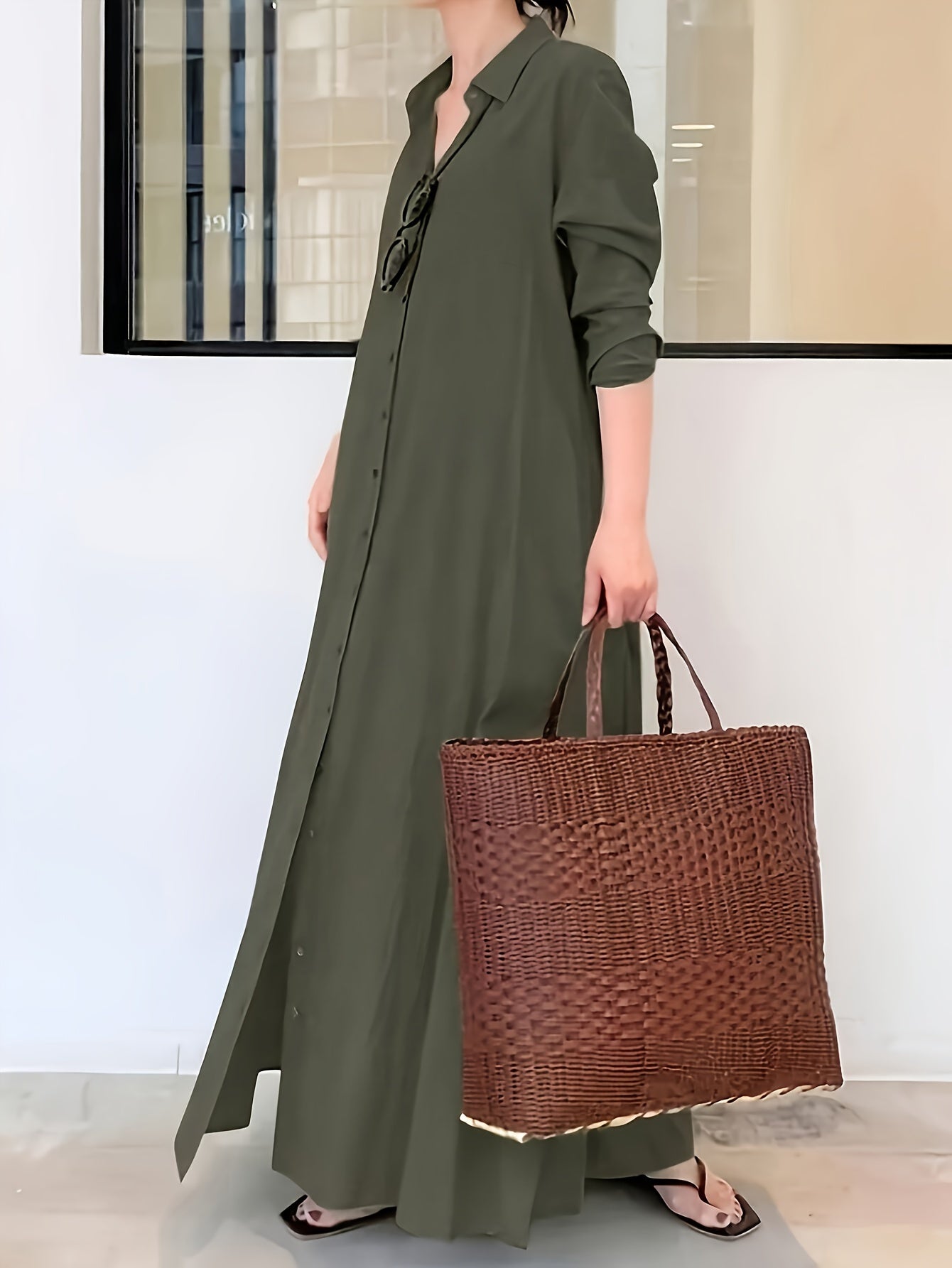 Button front shirt dress in solid color, loose fit maxi style with long sleeves for spring and fall.