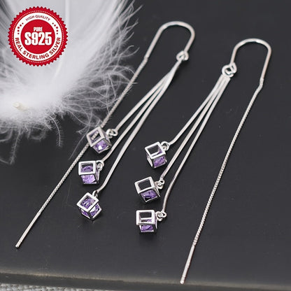 These trendy silver tassel earrings are perfect for those with sensitive skin. The long square design with tassel ear drops adds a chic touch to any outfit and can help to accentuate a slim face. The curved hook earrings are sure to add personality to